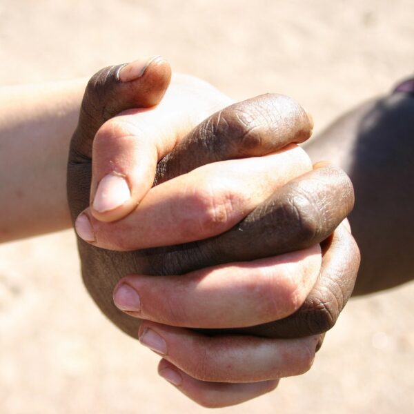 two-men-hold-sign-that-says-donation cl